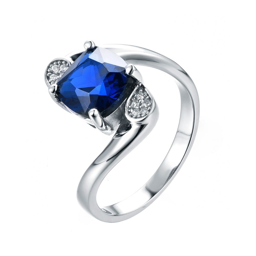 Princess Cut Blue Sapphire and Diamond Three Stone Engagement Ring in Contemporary Twist Setting