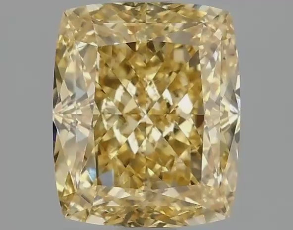 Radiant Cut Fancy Yellow Diamond Three-Stone Ring in White Gold