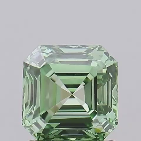 Princess Cut Green Diamond and Diamond Three-Stone Ring in Contemporary Twist Setting